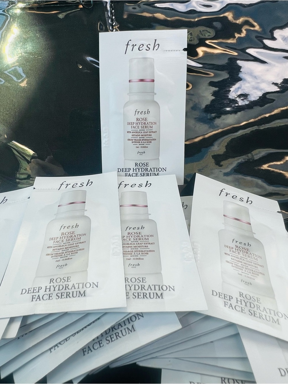 Lot of 32 Fresh Rose Deep Hydration Face Serum - White/Pink Travel Sample Pack